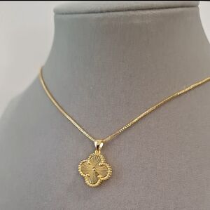 Double sided gold-filled clover necklace.